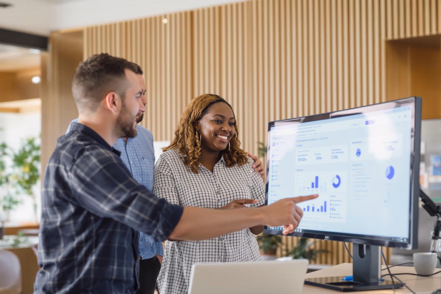 The Orvanta team reviewing a client's live analytics dashboard